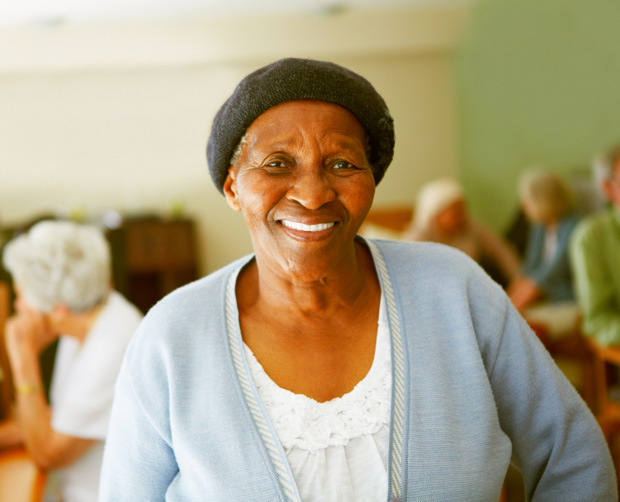 Woman wearing a blue top smiling