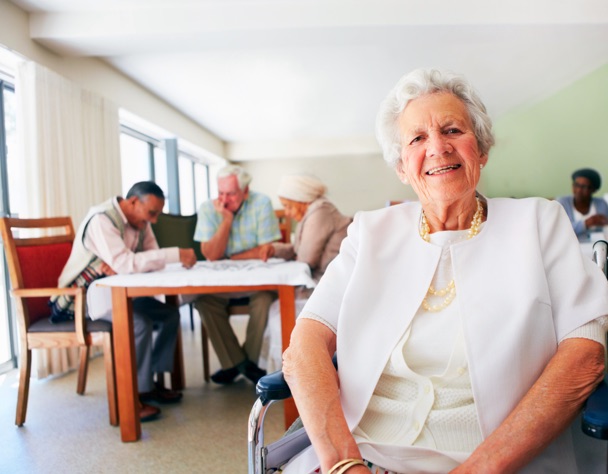 Senior woman in a wheelchair smiling